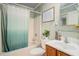 Small bathroom with shower/tub combo and wood vanity at 882 Sedge Ct, Charleston, SC 29412