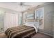 Bedroom with leopard print comforter and white doors at 882 Sedge Ct, Charleston, SC 29412