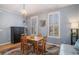 Dining area with wooden table and chairs, and hardwood floors at 882 Sedge Ct, Charleston, SC 29412