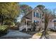 Two-story house with a front porch and a driveway at 882 Sedge Ct, Charleston, SC 29412