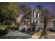 Two-story house with a front porch at dusk at 882 Sedge Ct, Charleston, SC 29412