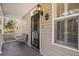 Front porch with black door and white railings at 882 Sedge Ct, Charleston, SC 29412