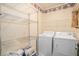 Laundry room with washer, dryer, and shelving at 882 Sedge Ct, Charleston, SC 29412