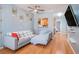 Spacious living room with hardwood floors and sectional sofa at 882 Sedge Ct, Charleston, SC 29412