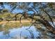 Scenic waterfront property showcasing tranquil waters and lush greenery at 882 Sedge Ct, Charleston, SC 29412