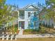 Two-story light blue house with a front porch and balcony at 103 Green Grass Rd, Summerville, SC 29483