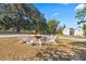 Fire pit with white Adirondack chairs at 103 Green Grass Rd, Summerville, SC 29483