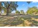 Spacious front yard with large oak trees and well-manicured lawn at 103 Green Grass Rd, Summerville, SC 29483