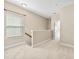 Upstairs landing with carpeted floor and window at 103 Green Grass Rd, Summerville, SC 29483