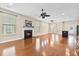 Open living room with hardwood floors and fireplace at 103 Green Grass Rd, Summerville, SC 29483