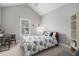 Bright bedroom with a comfortable bed, desk, and built-in shelving at 1034 Bradbury Ln, Charleston, SC 29492