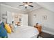 Bedroom with a queen bed, access to another room, and a ceiling fan at 1034 Bradbury Ln, Charleston, SC 29492