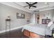 Spacious main bedroom with ensuite bathroom and hardwood floors at 1034 Bradbury Ln, Charleston, SC 29492