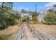 Private wooden dock and walkway to the water at 1034 Bradbury Ln, Charleston, SC 29492