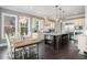 Gourmet kitchen boasts an island, stainless steel appliances, and custom cabinetry at 1034 Bradbury Ln, Charleston, SC 29492