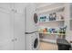 Laundry room with washer, dryer, and additional shelving for storage at 1034 Bradbury Ln, Charleston, SC 29492