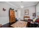 Cozy living room with built-in shelving and hardwood floors at 1034 Bradbury Ln, Charleston, SC 29492