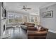 Open concept living room with fireplace and access to deck at 1034 Bradbury Ln, Charleston, SC 29492