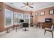 Home office with built-in shelving and a bay window at 1034 Bradbury Ln, Charleston, SC 29492
