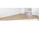Hardwood floor living room with access to kitchen and hallway at 114 Lilac Grove Way, Summerville, SC 29486
