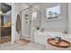 Relaxing bathroom with soaking tub, shower, and modern finishes at 117 Upper Trestles Ave, Summerville, SC 29483