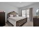 Spacious bedroom with king-size bed and large windows at 117 Upper Trestles Ave, Summerville, SC 29483