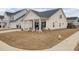 House exterior showcasing a manicured lawn at 117 Upper Trestles Ave, Summerville, SC 29483