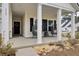 Front porch with seating area, inviting entryway at 117 Upper Trestles Ave, Summerville, SC 29483