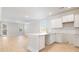 Open kitchen with white cabinets, quartz countertops, and stainless steel sink at 118 Midmills Ln, Summerville, SC 29486