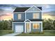 Two-story house with blue siding, white garage door, and landscaping at 120 Midmills Ln, Summerville, SC 29486