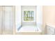 Relaxing bathroom with soaking tub and walk-in shower at 126 Lilac Grove Way, Summerville, SC 29486
