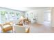 Spacious bonus room with seating area, table, and access to another room at 126 Lilac Grove Way, Summerville, SC 29486