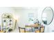 Bright home office with a desk, large mirror, and built-in shelving at 126 Lilac Grove Way, Summerville, SC 29486