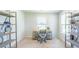 Bright home office with built-in shelving and large windows at 126 Lilac Grove Way, Summerville, SC 29486