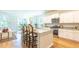 Modern kitchen with white cabinets, granite countertops, and stainless steel appliances at 126 Lilac Grove Way, Summerville, SC 29486