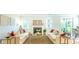 Relaxing living room with two sofas, a coffee table, and a fireplace at 126 Lilac Grove Way, Summerville, SC 29486