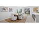 Elegant dining room featuring a wooden table and access to a backyard at 129 Lilac Grove Way, Summerville, SC 29486