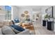 Spacious living room with light beige couch and wooden coffee table at 129 Lilac Grove Way, Summerville, SC 29486