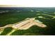 Aerial view of homesites, roads, and natural surroundings at 132 Lilac Grove Way, Summerville, SC 29486