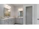 Double vanity bathroom with large mirror and walk-in shower at 132 Lilac Grove Way, Summerville, SC 29486