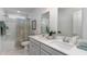 Clean bathroom with double vanity and shower/tub combo at 132 Lilac Grove Way, Summerville, SC 29486