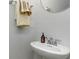 Clean bathroom with pedestal sink and updated fixtures at 132 Lilac Grove Way, Summerville, SC 29486