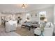 Open living room with a neutral color scheme and an open floor plan at 132 Lilac Grove Way, Summerville, SC 29486