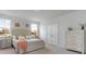 Spacious main bedroom with large windows and en-suite bathroom at 132 Lilac Grove Way, Summerville, SC 29486