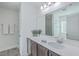 Clean bathroom with a large vanity and soaking tub at 1455 Red Tide Rd, Mount Pleasant, SC 29466