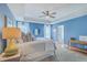 Bright bedroom with a comfortable bed and en-suite bathroom at 1455 Red Tide Rd, Mount Pleasant, SC 29466