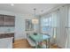 Bright dining area with light-colored walls and large windows at 1455 Red Tide Rd, Mount Pleasant, SC 29466