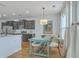 Charming dining area with a unique table and bench seating at 1455 Red Tide Rd, Mount Pleasant, SC 29466