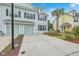 Two-story home with double garage and attractive landscaping at 1455 Red Tide Rd, Mount Pleasant, SC 29466