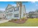 Two-story home with double garage and attractive landscaping at 1455 Red Tide Rd, Mount Pleasant, SC 29466